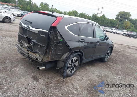 2015 Honda Cr-V Touring z USA, uszkodzony, nr VIN 5J6RM4H90FL014889
